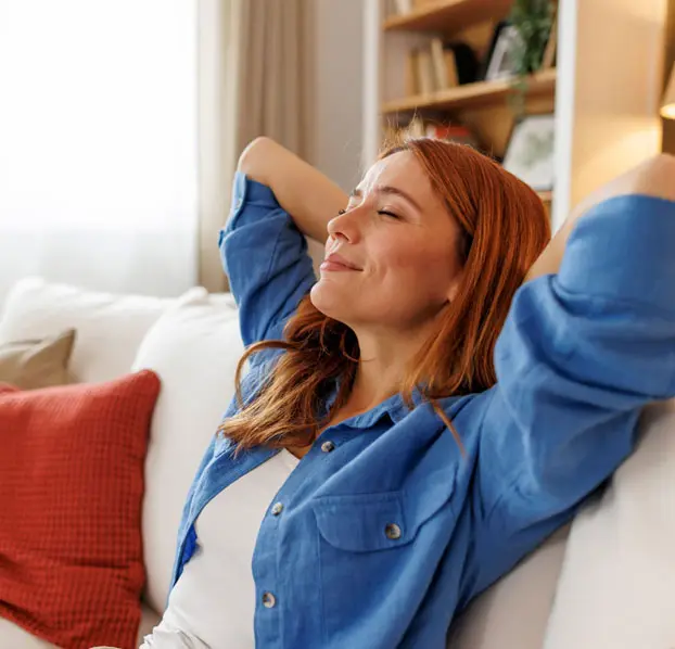 Confident woman reflecting on her financial future.