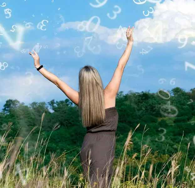 Woman raising her arms beneath symbolic numbers.